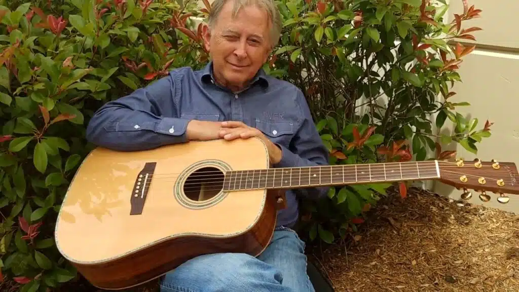  Denny Zager with a guitar